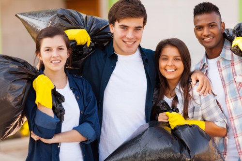 Team members managing recycling and waste processing